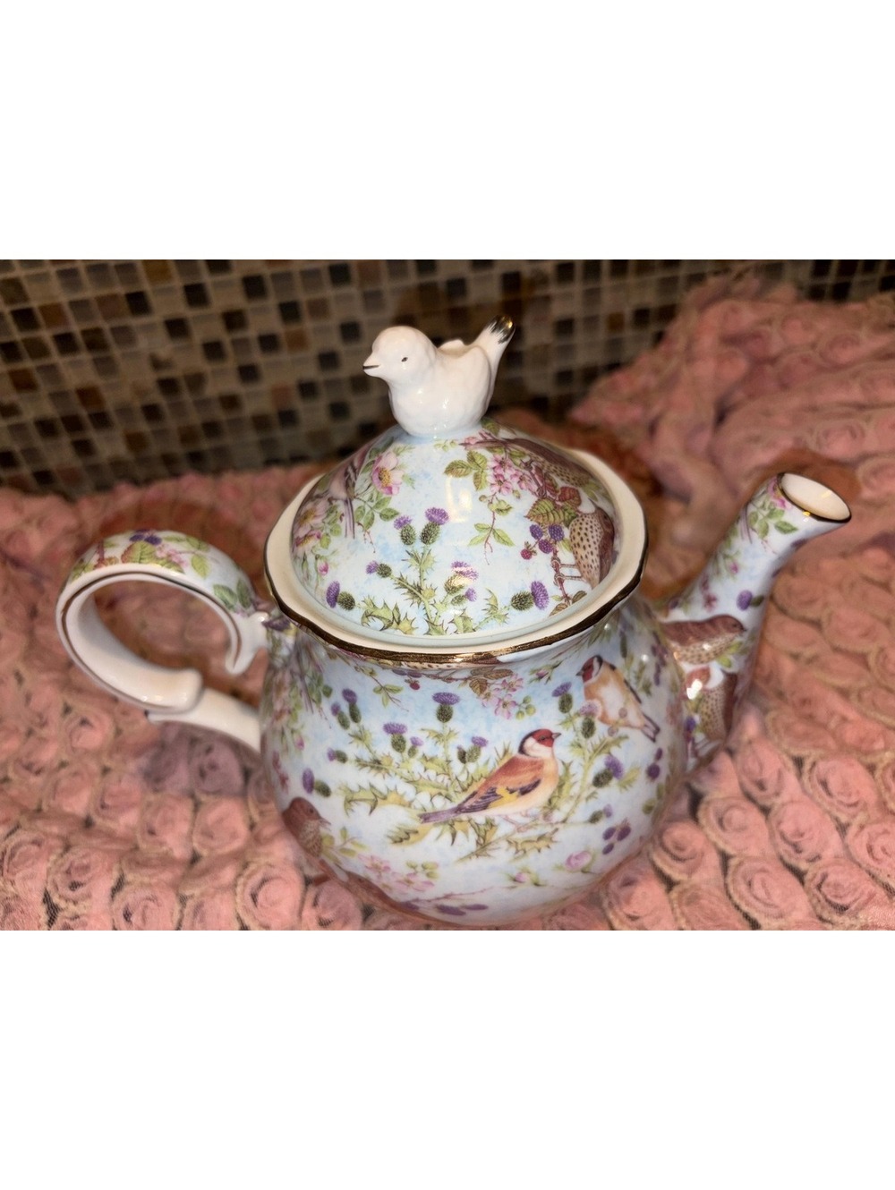 This is a Gracie China Blue Birds Chintz porcelain teapot with a bird finial.